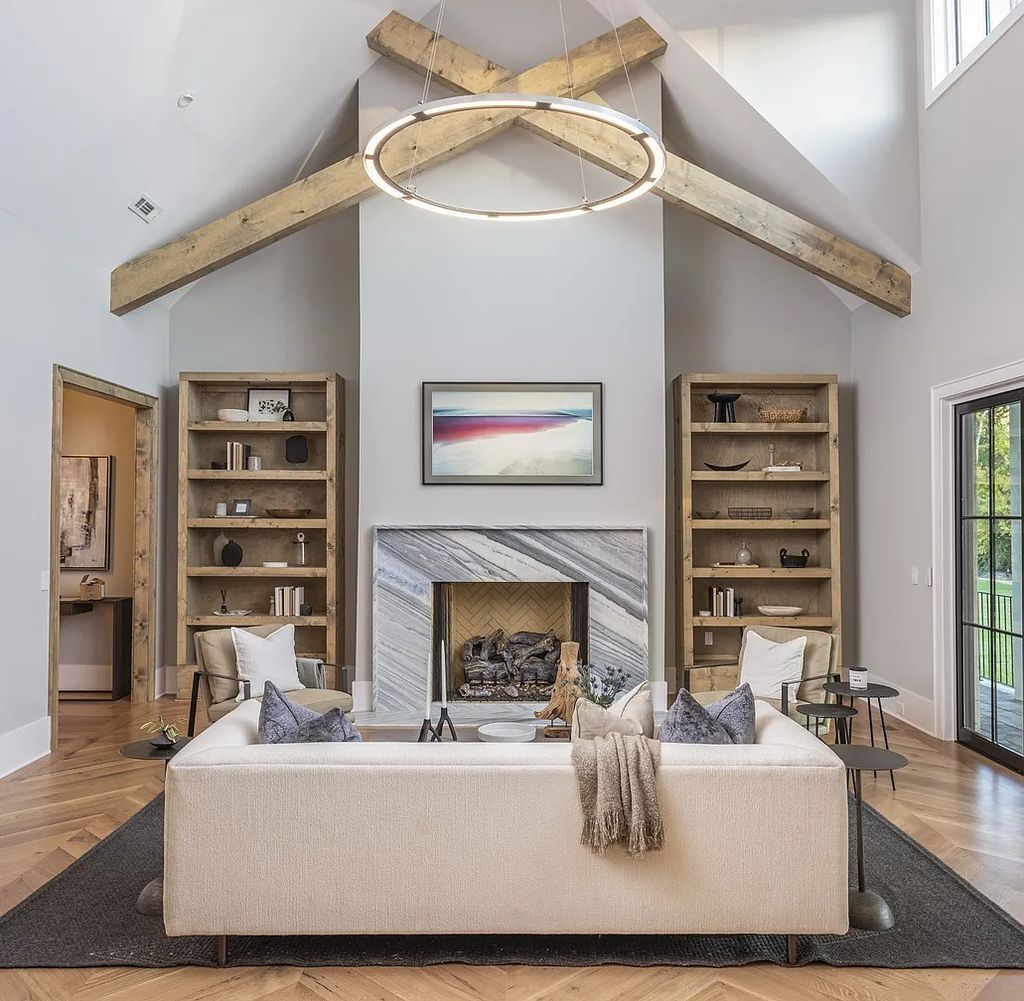 The Home in Brentwood on 2 acres offers bright open concept living with vaulted ceilings and wood beams throughout the home, now available for sale. This home located at 1545 Sunset Rd, Brentwood, Tennessee