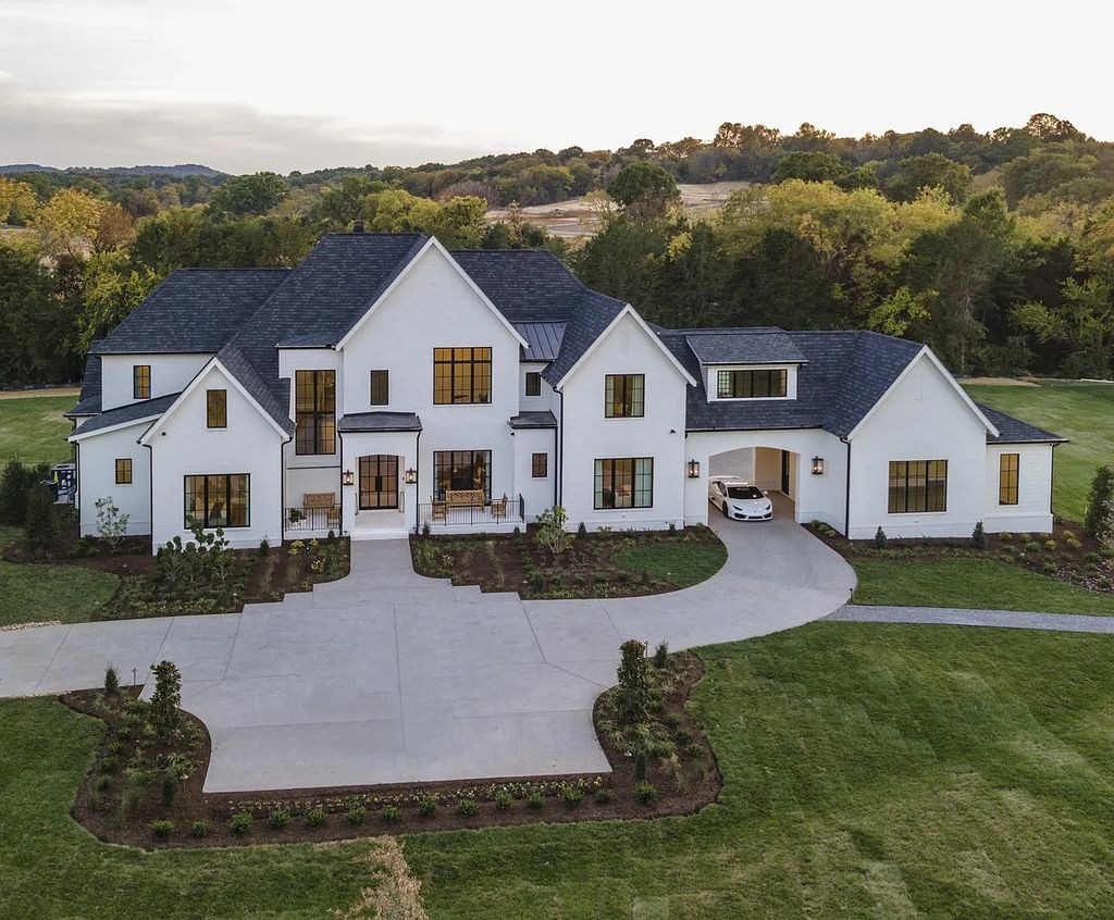 The Home in Brentwood on 2 acres offers bright open concept living with vaulted ceilings and wood beams throughout the home, now available for sale. This home located at 1545 Sunset Rd, Brentwood, Tennessee