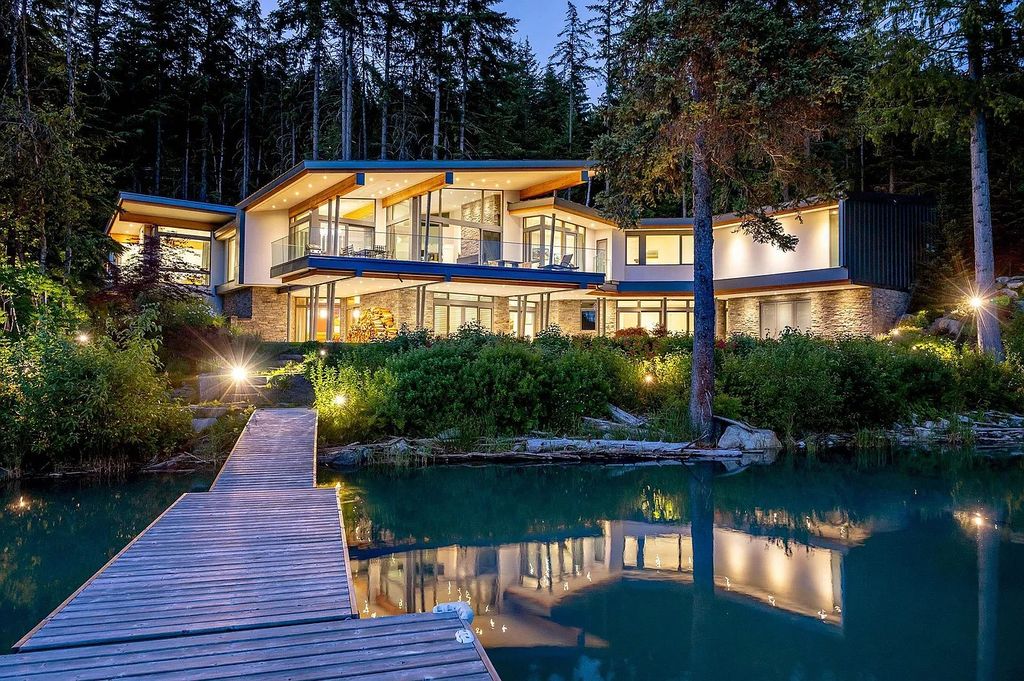The Estate in Vancouver is a luxurious home offering incomparable lake and mountain views and extreme privacy now available for sale. This home located at 8999 B Trudys Lndg, Whistler, Vancouver, Canada; offering 05 bedrooms and 07 bathrooms with 6,010 square feet of living spaces. 