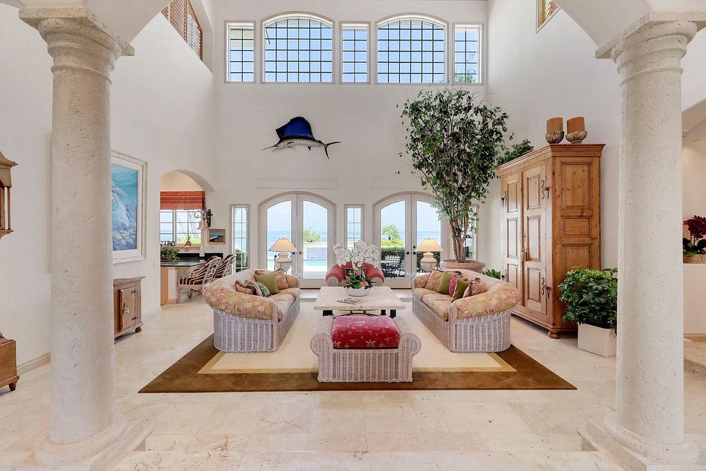 6761 SE North Marina Way, Stuart, Florida is a magnificent waterfront estate just minutes to the Atlantic Ocean perfect for entertaining, enjoy sunsets and tropical breezes from covered patios and open terraces.