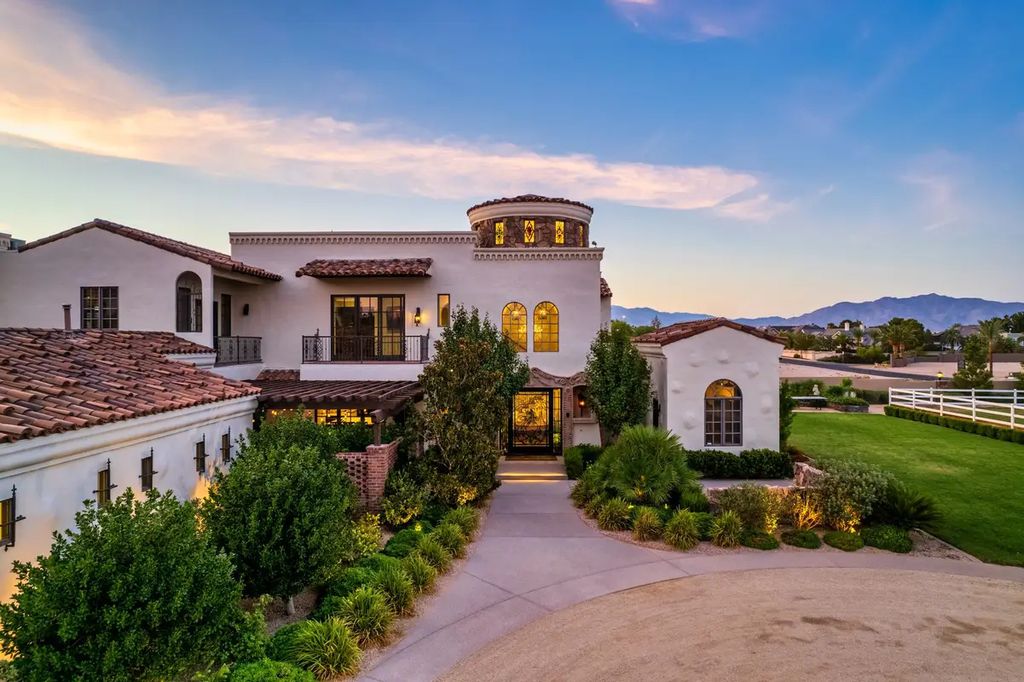 4225 N Jensen Street, Las Vegas, Nevada is a Hacienda-style home on 2.25 lush acres beaming with Spanish tile, rustic wood accents, archways, and multiple courtyards that allow for the ultimate year-round indoor outdoor living. 