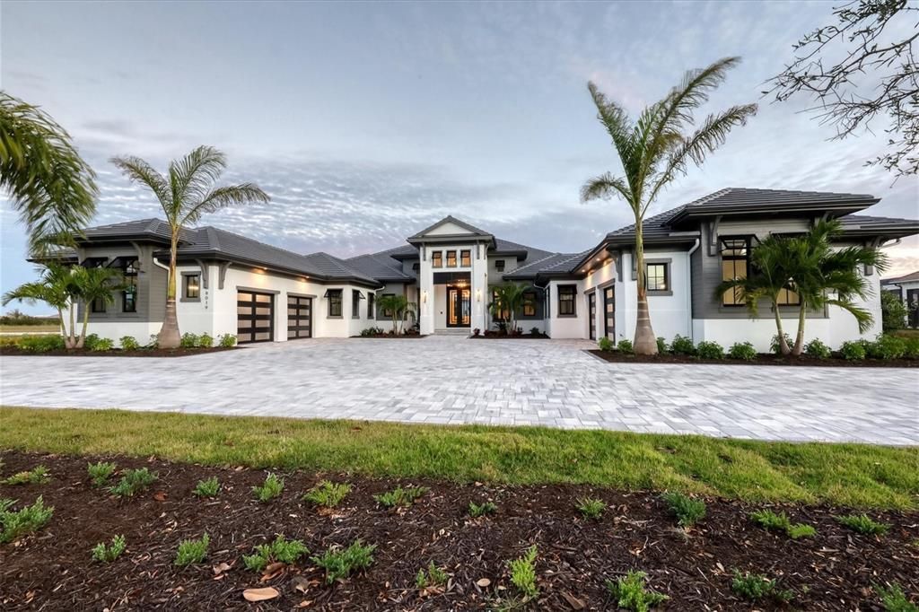 8019 Bowspirit Way, Lakewood Ranch, Florida, is a finally modern luxury and opulence in the Lake Club at Lakewood Ranch, situated on 1.13 acres. No other home built to such crafted and magnificent residence has every detail hand selected by the accomplished designers.