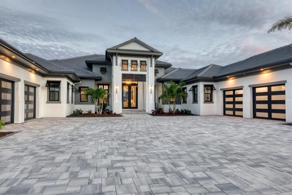 8019 Bowspirit Way, Lakewood Ranch, Florida, is a finally modern luxury and opulence in the Lake Club at Lakewood Ranch, situated on 1.13 acres. No other home built to such crafted and magnificent residence has every detail hand selected by the accomplished designers.