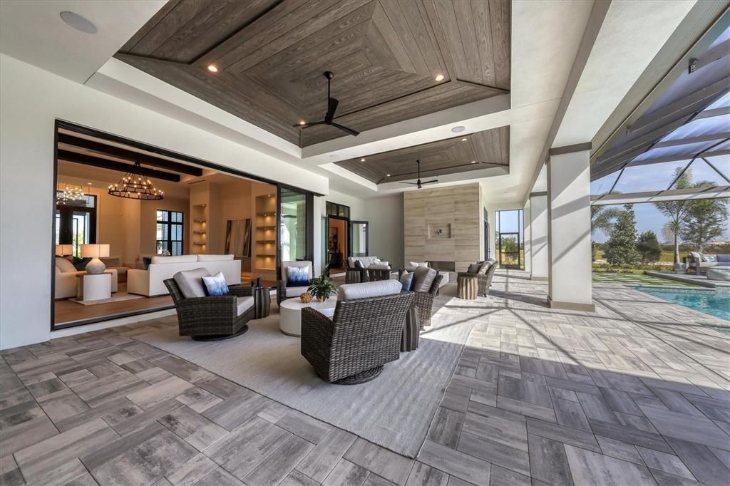 8019 Bowspirit Way, Lakewood Ranch, Florida, is a finally modern luxury and opulence in the Lake Club at Lakewood Ranch, situated on 1.13 acres. No other home built to such crafted and magnificent residence has every detail hand selected by the accomplished designers.