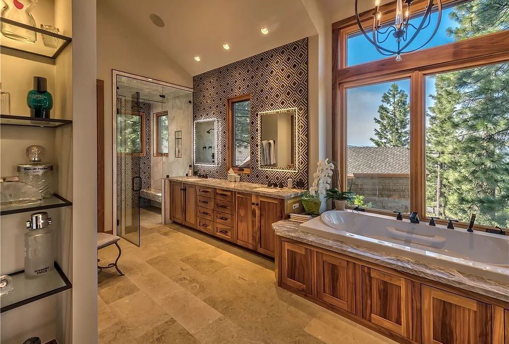 545 Eagle Drive, Incline Village, Nevada is a spectacular estate was meticulously crafted Susie Yanagi AIA design with high quality finish work including double quartzite kitchen islands, gated drive and interior paver heated courtyard.
