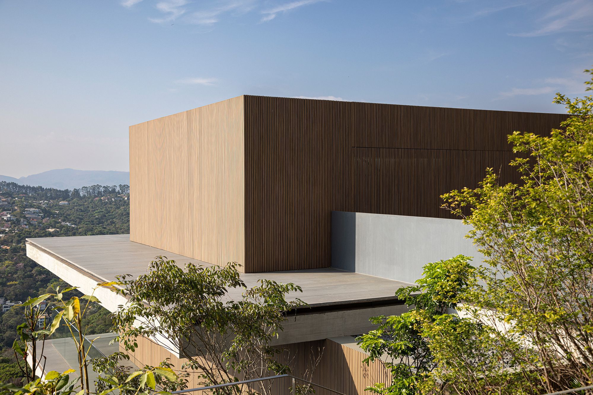 Minas House Rests Amid Rainforest Garden in Brazil by Studio mk27