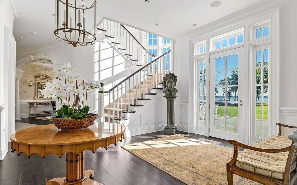 The Property in Saint Michaels is designed and built with unparalleled craftsmanship, as evidenced by the moldings, staircases, and woodwork throughout the residence, now available for sale. This home located at 7751 Rollyston Dr, Saint Michaels, Maryland