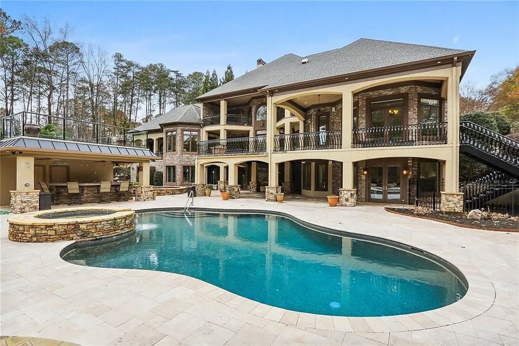 The Estate in Buford is a luxurious home offering the ultimate in privacy now available for sale. This home located at 6617 Garrett Rd, Buford, Georgia; offering 06 bedrooms and 07 bathrooms with 10,200 square feet of living spaces.