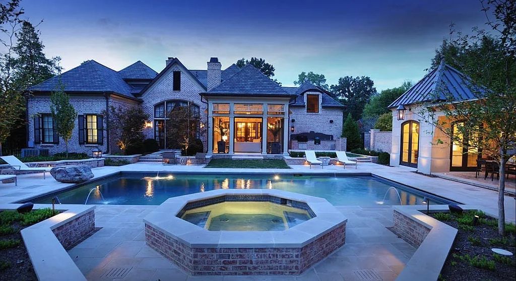 The Estate in Nashville is a luxurious home featuring stunning pool and spa, beautiful landscaping and outdoor kitchen now available for sale. This home located at 34 Lynnwood Ln, Nashville, Tennessee; offering 05 bedrooms and 08 bathrooms with 6,373 square feet of living spaces. 