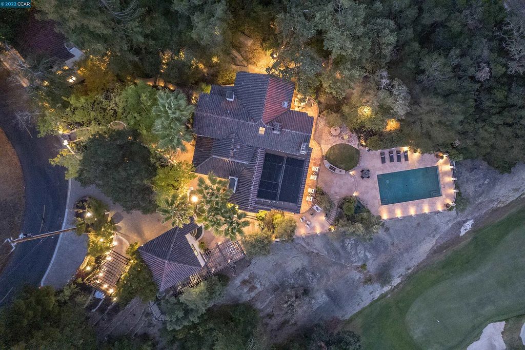 160 Camino Don Miguel, Orinda, California is a Spanish Revival estate originally constructed in 1929 sited on private gated grounds with breathtaking panoramic views, Mediterranean landscaping, offer a resort-like setting with direct access to the Orinda Country Club golf course.