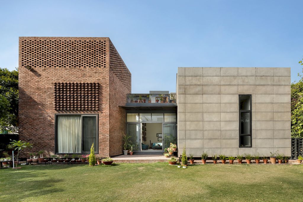 The Brick House with Picturesque Views of Nature by Studio Ardete