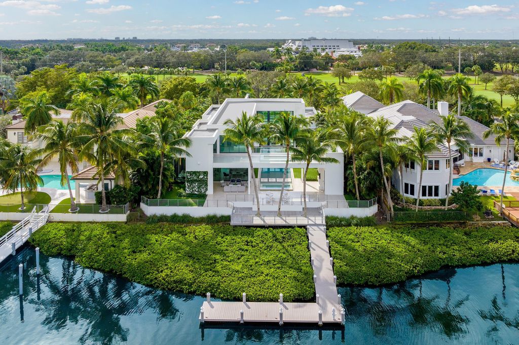 160 Spyglass Lane, Jupiter, Florida, stands out among the elegance of Jupiter’s coveted Admiral’s Cove, with intricate stone and wood finishes. A summer kitchen and 100 feet of pristine beach on the outside, with views of the Intracoastal Waterway, make this a truly delightful location.