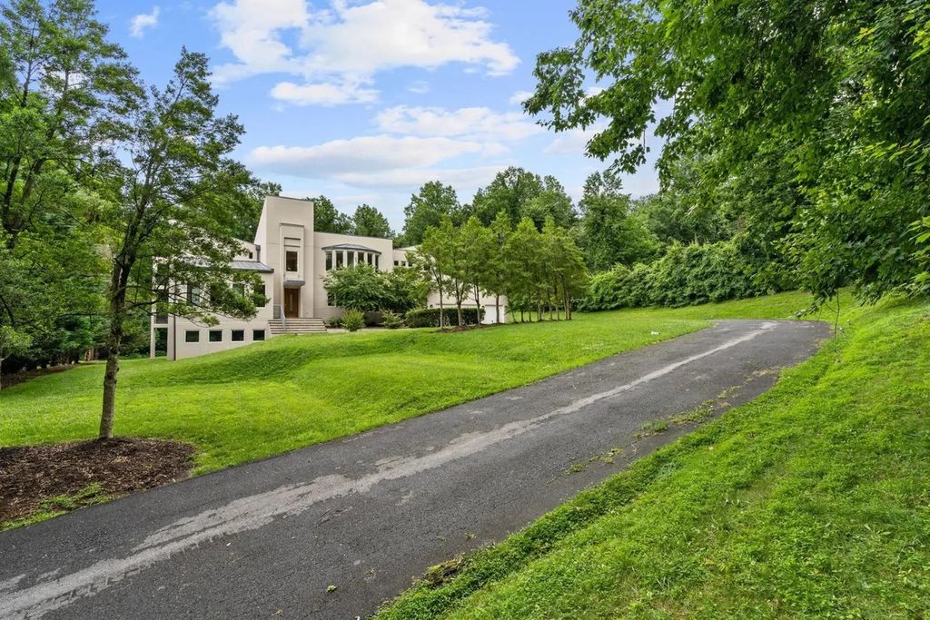 The Residence in McLean is a fully updated estate with luxurious amenities, now available for sale. This home located at 8636 Old Dominion Dr, McLean, Virginia