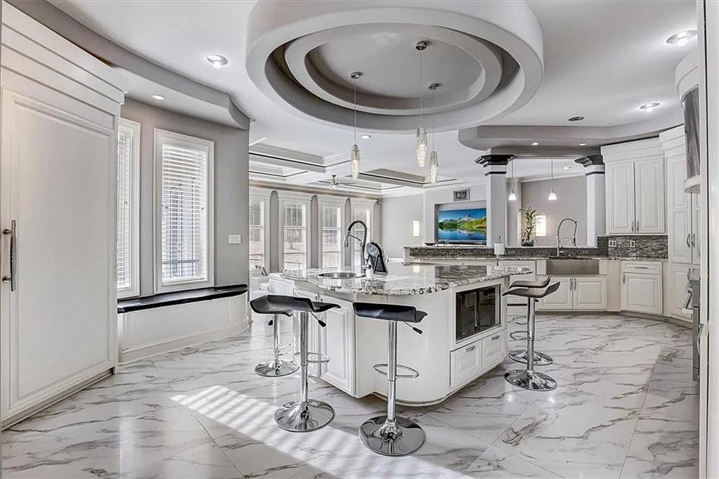 The Estate in Stone Mountain is a luxurious home where beautiful flow and natural light are awe-inspiring now available for sale. This home located at 3125 Juhan Rd, Stone Mountain, Georgia; offering 08 bedrooms and 09 bathrooms with 15,906 square feet of living spaces. 