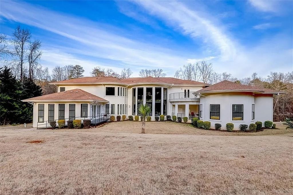 The Estate in Stone Mountain is a luxurious home where beautiful flow and natural light are awe-inspiring now available for sale. This home located at 3125 Juhan Rd, Stone Mountain, Georgia; offering 08 bedrooms and 09 bathrooms with 15,906 square feet of living spaces. 