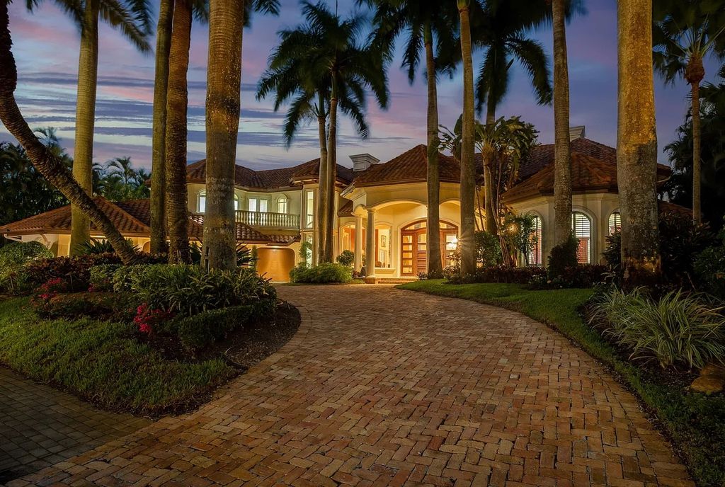 17951 Lake Estates Drive, Boca Raton, Florida is a estate style property and residence has exceptional waterfront vistas overlooking the rolling hills of the Arnold Palmer signature east course par five hole.