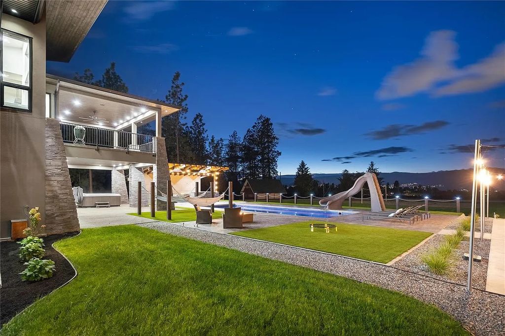The Estate in Kelowna has been exquisitely finished with stone detailing, granite surfaces and 11 ft ceilings on both levels, now available for sale. This home located at 4236 Spiers Rd, Kelowna, BC V1W 4E3, Canada