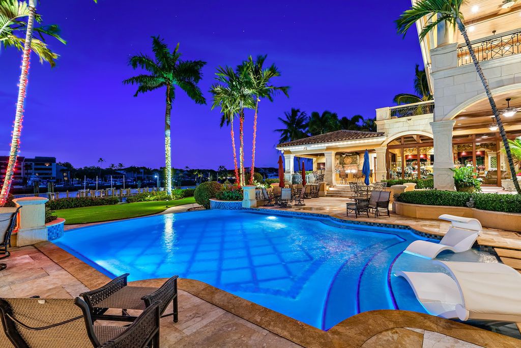 2330 Seven Oaks Lane, Palm Beach Gardens, Florida, offers unparalleled privacy and serenity on 2.6 acres with 150' of waterfrontage. The residence is built with stem walls and a concrete slab second floor in the heart of North County.