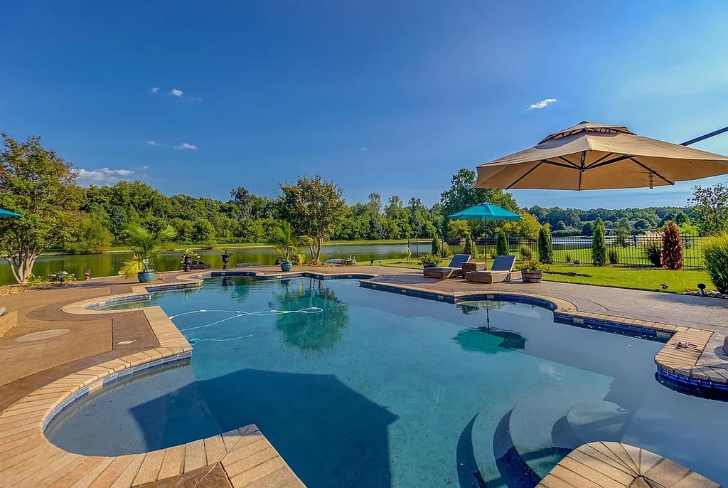 The Estate in Jackson is a luxurious home possessing a private lake that leads to a life of luxury now available for sale. This home located at 118 Northhaven Dr, Jackson, Tennessee; offering 04 bedrooms and 08 bathrooms with 9,147 square feet of living spaces.