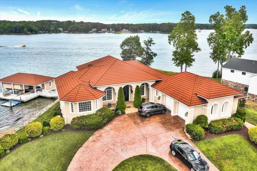 The Estate in Moneta is a luxurious home located in a park place to enjoy natural sandy beach views now available for sale. This home located at 999 Park Way Ave, Moneta, Virginia; offering 04 bedrooms and 06 bathrooms with 5,300 square feet of living spaces. 