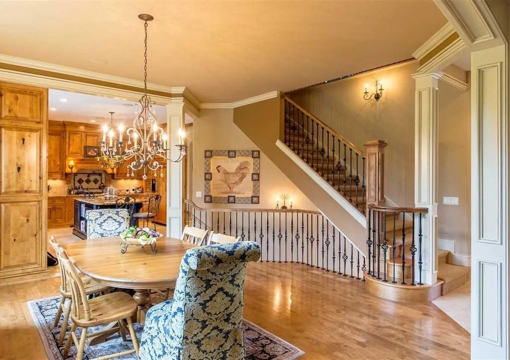 The House in Traverse City is the perfect place to entertain family and friends, featuring: a full outdoor kitchen, warm cozy fireplace and a large heated pool, now available for sale. This home located at 7799 Underwood Rdg, Traverse City, Michigan