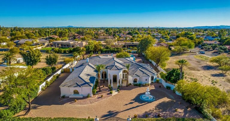 Listed At $3.499 Million, This Elegant Timeless Single Level Home in Scottsdale Arizona Welcomes You With Breathtaking Entry And A Dramatic Fountain