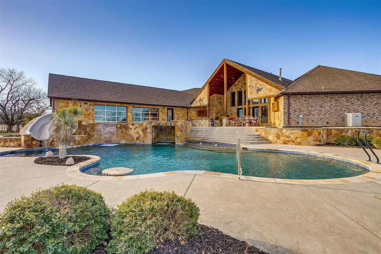 This Perfect $2.5 Million Home in Springtown Texas Provides The Ultimate Outdoor Entertaining Space With An Oversized Infinity Edge Pool