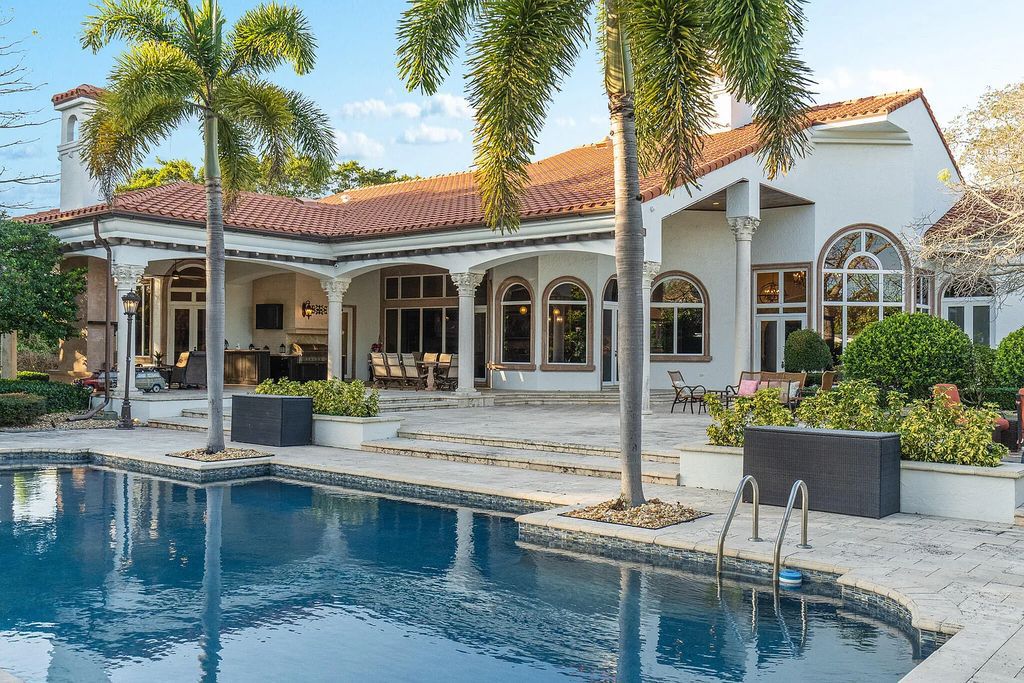 6030 Le Lac Road, Boca Raton, Florida, designed by award-winning architect Randall Stofft, is an exquisite lakefront estate located on 2.13 acres of meticulously manicured grounds within Boca Raton's most prestigious neighborhoods.