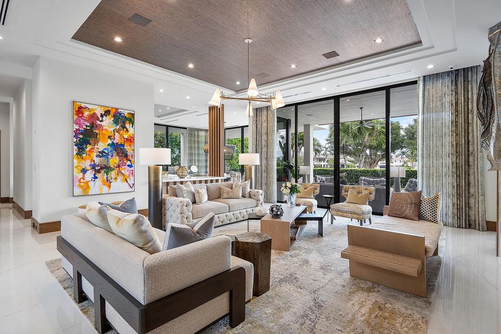 1440 Thatch Palm Drive, Boca Raton, Florida, is an SRD Building Corp, with exceptional craftsmanship and finishes and fully integrated Crestron smart-home system.