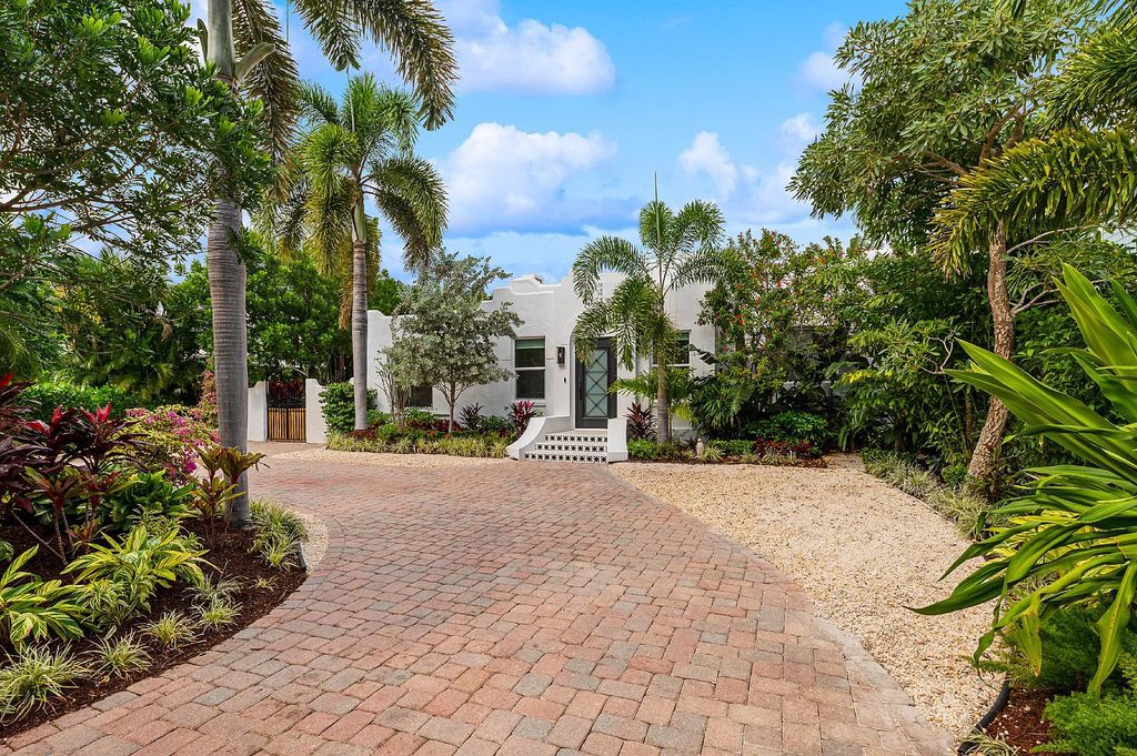 111 NE 12th Street, Delray Beach, Florida, is situated on an oversized lot & located 'in town' off Historic N Swinton Ave affording the lucky owners a coveted lifestyle. The luxuriously appointed main home is designed to accommodate the most discerning buyer's needs.