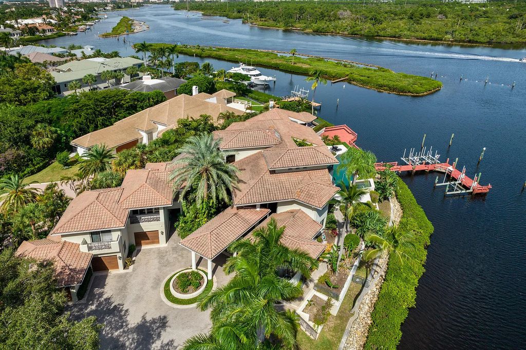 217 Commodore Drive, Jupiter, Florida is a stunning property sit on one of the largest water frontage lots on Commodore Island surrounded by new custom estates, a resort style pool with stunning orange sunsets and intracoastal activity.