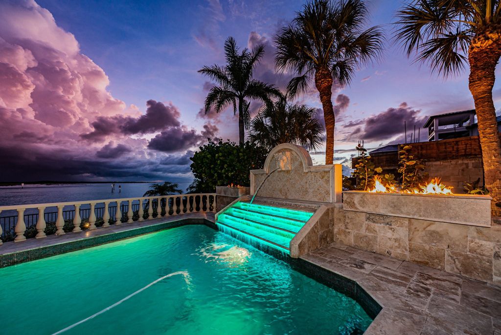 940 Monte Cristo Boulevard, Tierra Verde, Florida is a magnificent estate with spectacular and rare views of the Gulf of Mexico and Shell Key preserve, has been upgraded to a superior level of quality and finish, with extraordinary materials, craftsmanship and updates too numerous to mention.