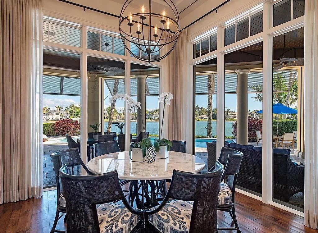 3787 Fort Charles Drive, Naples, Florida, penned by Jeff Harrell and executed by BCB Homes, totes wide water vistas from nearly every vantage point.