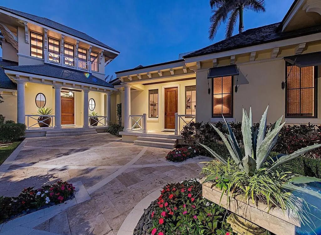 3787 Fort Charles Drive, Naples, Florida, penned by Jeff Harrell and executed by BCB Homes, totes wide water vistas from nearly every vantage point.