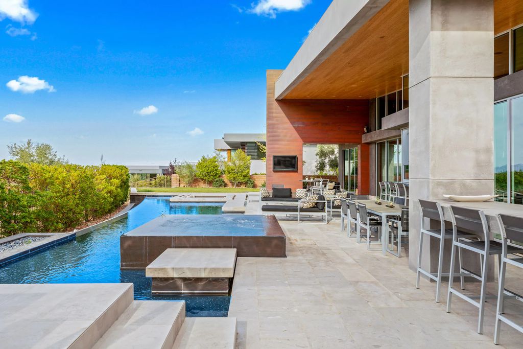 8 Meadowhawk Lane, Summerlin, Nevada is an architecturally significant custom home with seamless indoor outdoor living in warmth and tranquility, clean lines and impeccable design aimed at taking advantage of the Las Vegas area skyline views.