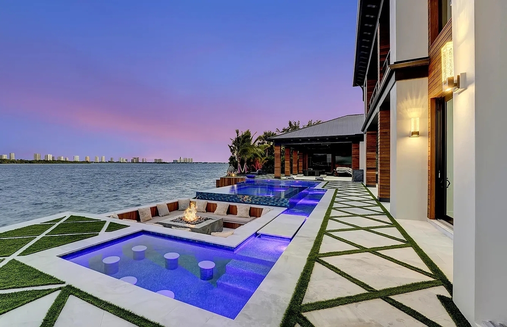 107 Bowsprit Drive, North Palm Beach, Florida is a brand new waterfront estate designed by High Tide Waterfront Properties sit on a premier cul-de-sac lot in the coveted Village of North Palm Beach. 