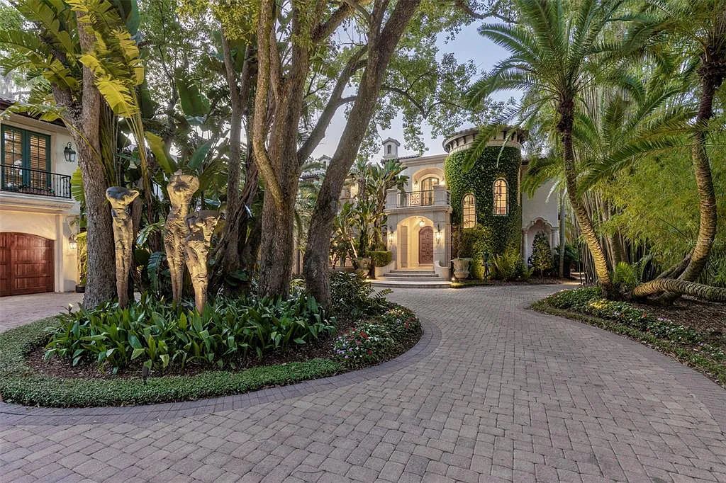 1220 N Park Avenue, Winter Park, Florida is a gated estate situated on Winter Park Chain of Lakes in the the most exclusive location in Twelve Oaks on a private road, originally designed with architectural features from around the world with amenities and features in the house that are unlike anything seen before.