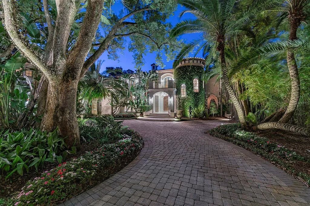 1220 N Park Avenue, Winter Park, Florida is a gated estate situated on Winter Park Chain of Lakes in the the most exclusive location in Twelve Oaks on a private road, originally designed with architectural features from around the world with amenities and features in the house that are unlike anything seen before.
