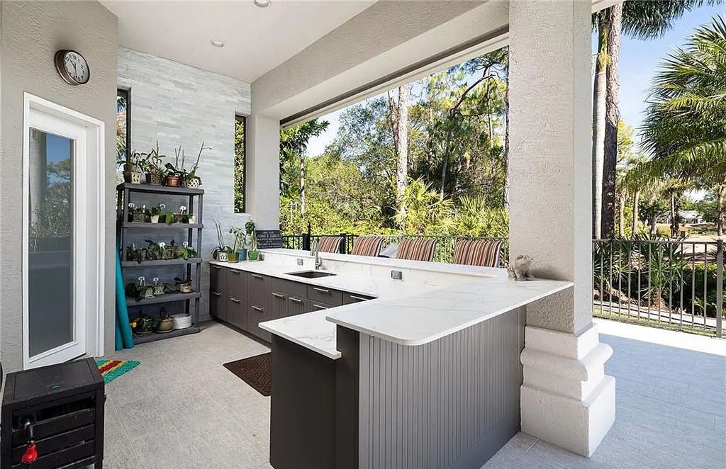 2610 Bulrush Lane, Naples, Florida, is located just minutes from Naples gorgeous beaches and downtown shopping, dining and nightlife.