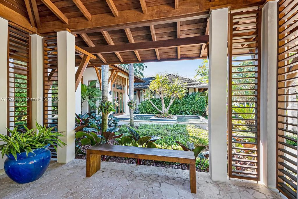 8601 Ponce De Leon Road, Miami, Florida, is ideal for family gatherings while providing ample indoor/outdoor spaces for a recreational and relaxing living experience.
