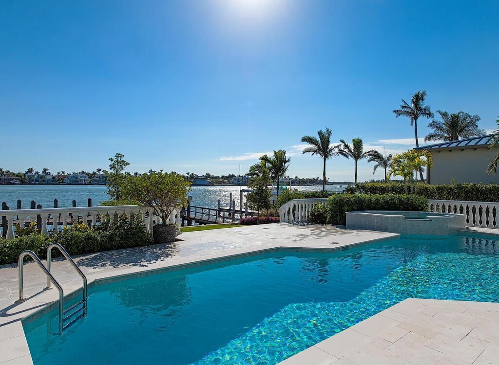 1947 8th Street South, Naples, Florida is spectacular residence on a unique location in the heart of Downtown capturing unparalleled views down Naples Bay towards Gordons Pass.