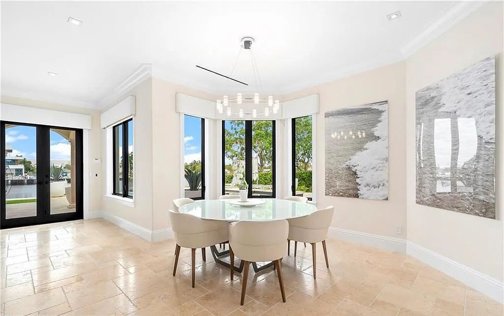 1515 Middle River Drive, Fort Lauderdale, Florida is a fully renovated home with the finest finishes including top of the Line Hansgrohe fixtures, private media room, Jerusalem tile and driftwood flooring, upstairs/downstairs laundry appliances for convenience and more. 