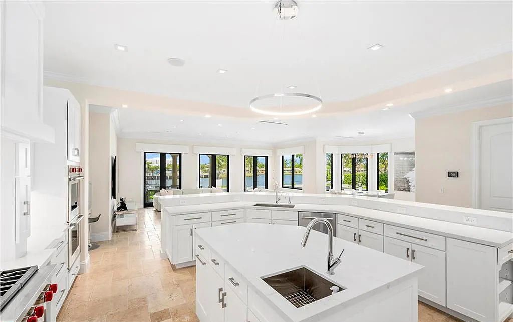 1515 Middle River Drive, Fort Lauderdale, Florida is a fully renovated home with the finest finishes including top of the Line Hansgrohe fixtures, private media room, Jerusalem tile and driftwood flooring, upstairs/downstairs laundry appliances for convenience and more. 