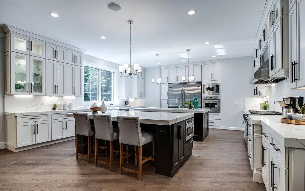 The Home in Mc Lean showcases a blend of an open floor plan and traditional floor plan concepts, now available for sale. This home located at 1200 Dominion Ct, Mc Lean, Virginia