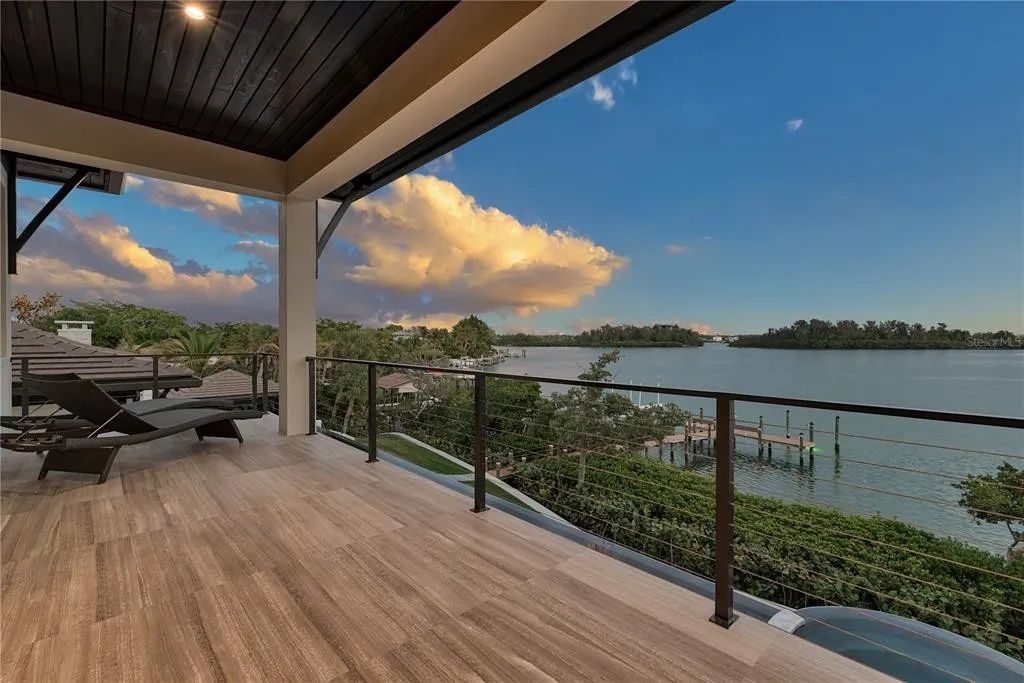 3799 Flamingo Avenue, Sarasota, Florida is an island paradise and strategically located to provide quick access to Sarasota’s shopping, dining, and world-renowned attractions, designed for entertaining and a relaxed island lifestyle. 