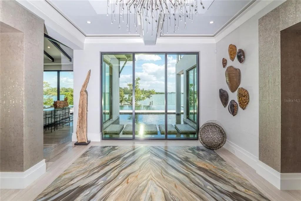 3799 Flamingo Avenue, Sarasota, Florida is an island paradise and strategically located to provide quick access to Sarasota’s shopping, dining, and world-renowned attractions, designed for entertaining and a relaxed island lifestyle. 