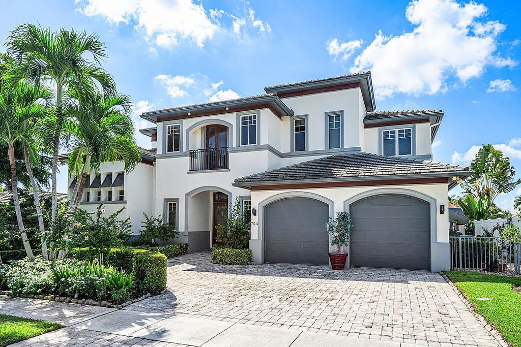 724 NE 36th Street, Boca Raton, Florida is a gorgeous Contemporary custom estate built by Terry Cudmore & designed by Randy Stofft in the premier community of Lake Rogers close to shops, dining the beach.
