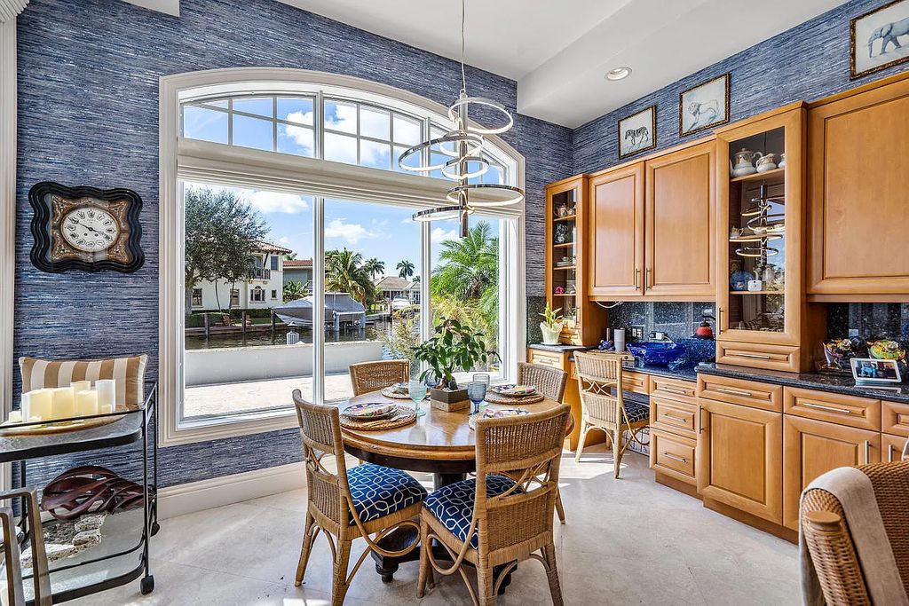 724 NE 36th Street, Boca Raton, Florida is a gorgeous Contemporary custom estate built by Terry Cudmore & designed by Randy Stofft in the premier community of Lake Rogers close to shops, dining the beach.