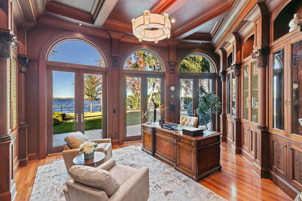 9275 Point Cypress Drive, Orlando, Florida is a luxury property features dual lake frontage between Lake Tibet & Lake Sheen within the guard gated community of Cypress Point in a supremely convenient Butler Chain location. 