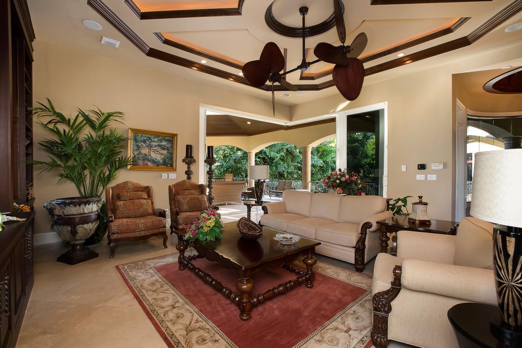 3170 Gordon Drive, Naples, Florida is a Mediterranean estate Just steps to the beach and only minutes to the fine shopping and cuisine of historic old Naples, amazing outdoor area include a large pool, several outdoor seating areas, and a state of the art outdoor kitchen.